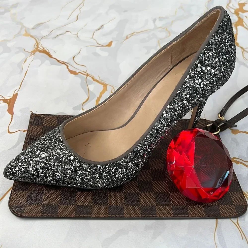 Silver glitter pumps brand is mix no. 6